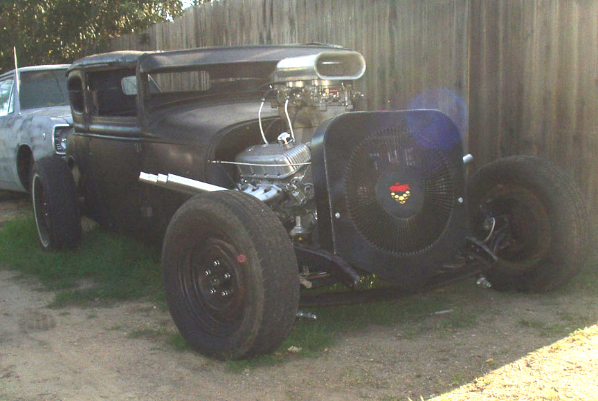 big block chevy, briggs cowl with 30 quarters, some doors, and it's alive!